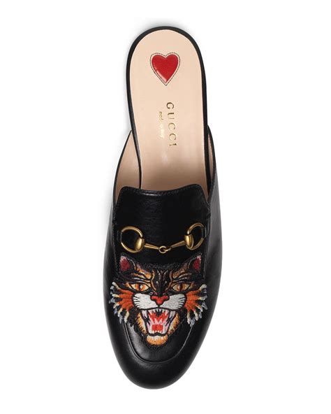 gucci mules tiger on foot